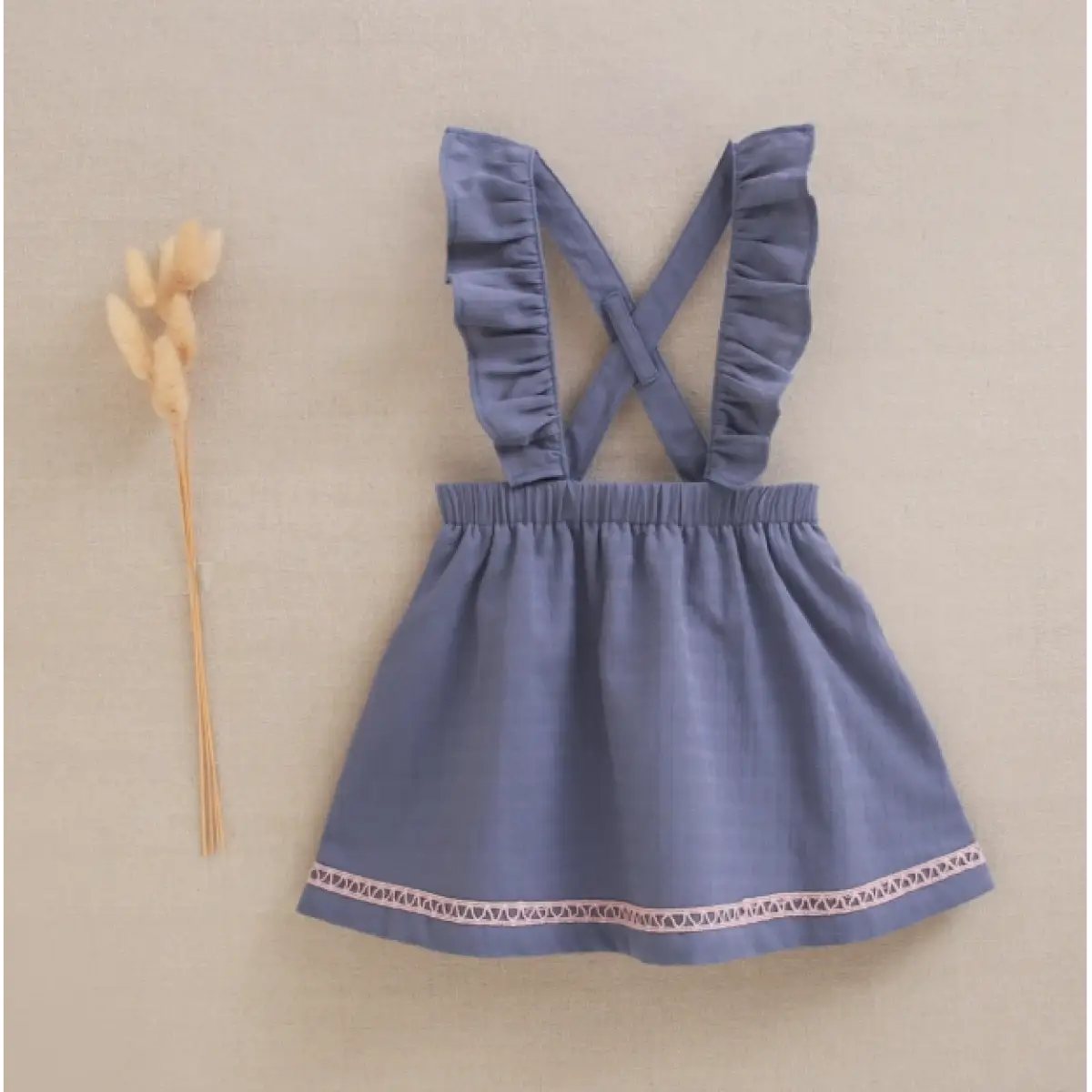 Ver Peto falda bebé niña azul detalles rosa