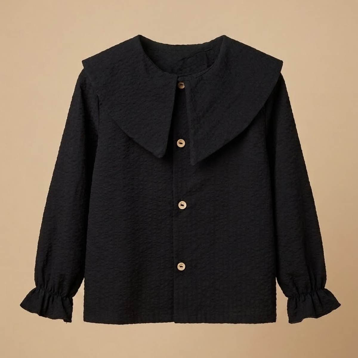 Ver Blusa niña negra cuello solapa
