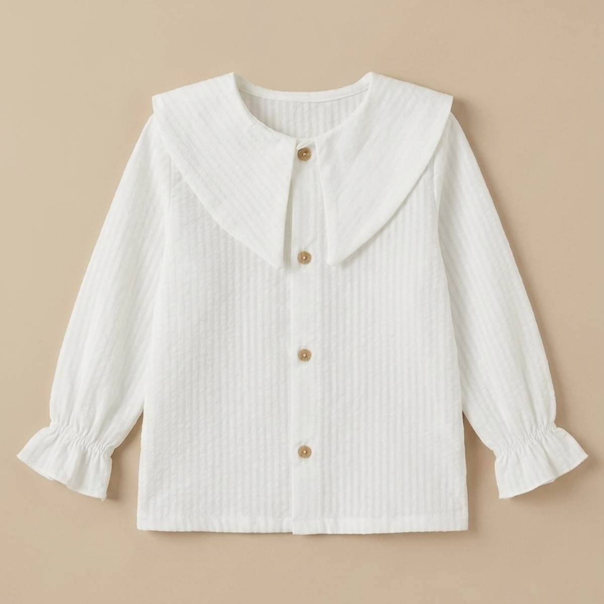 Ver Blusa niña blanca cuello solapa
