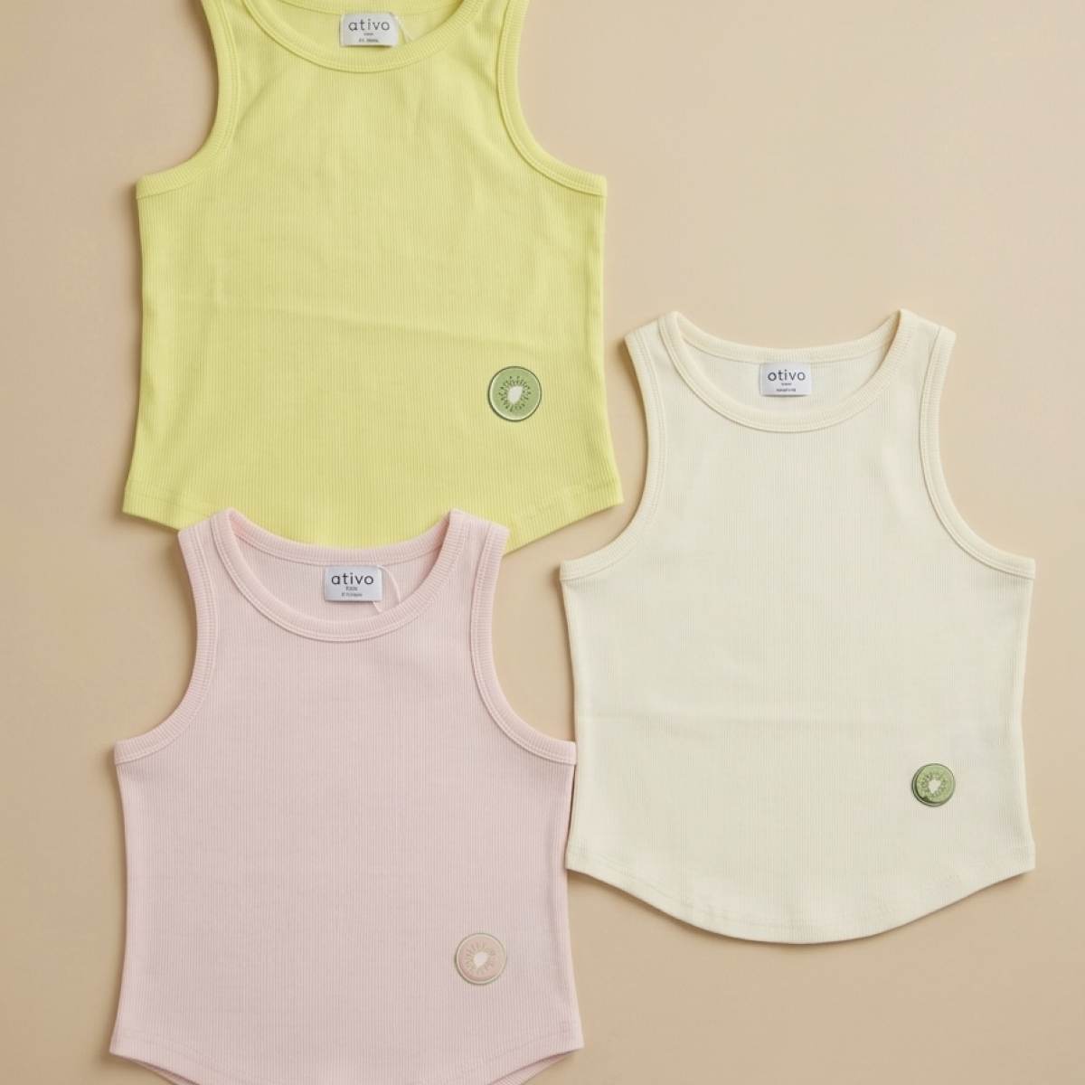 Ver Top canalé niña kiwi amarillo/beige/rosa
